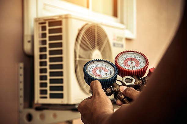 Professional Ductwork Repair technician working in Camp Lake, WI